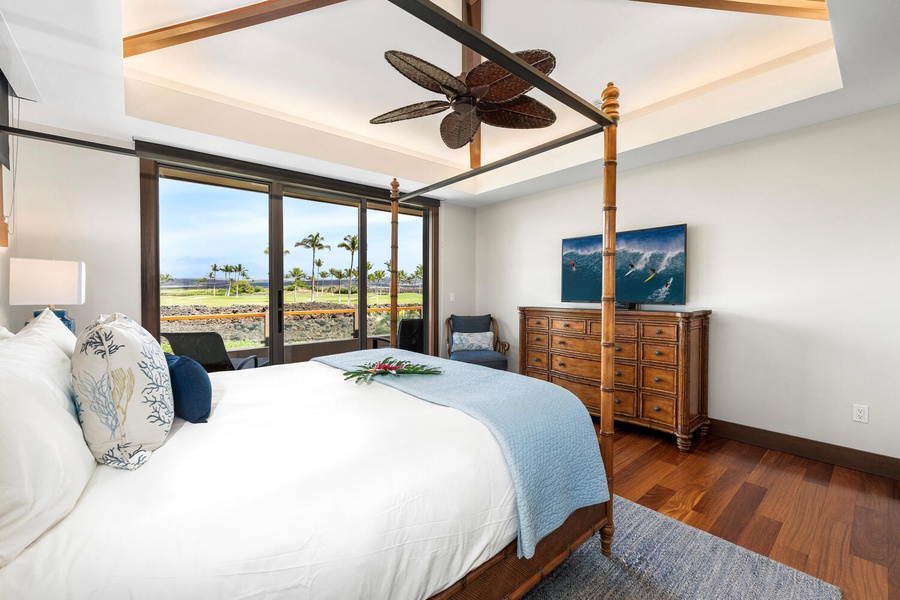 Wake to sweeping golf course and mountain views from the primary suite.
