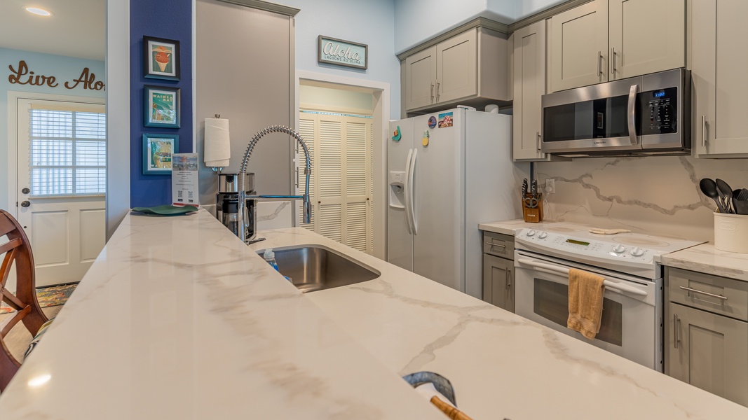 The kitchen is equipped with numerous amenities for your culinary adventures.