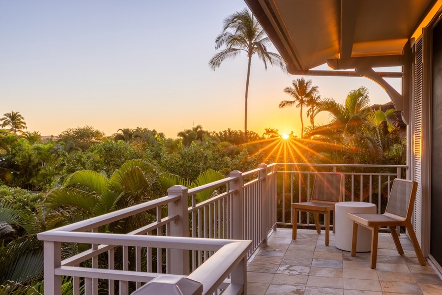 Seating area off of the third bedroom offers stunning sunset views.