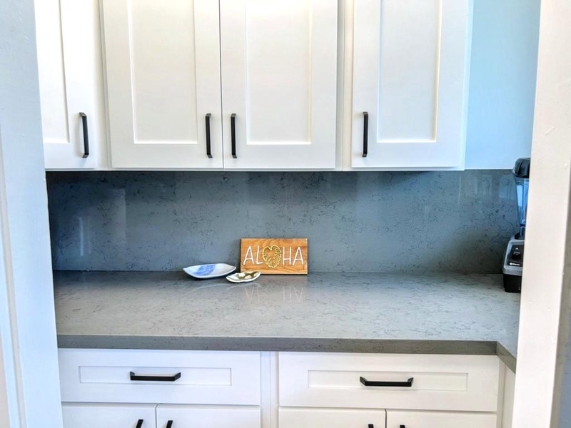 A stylish kitchen with sleek cabinetry and fresh finishes, making meal prep a breeze during your stay.