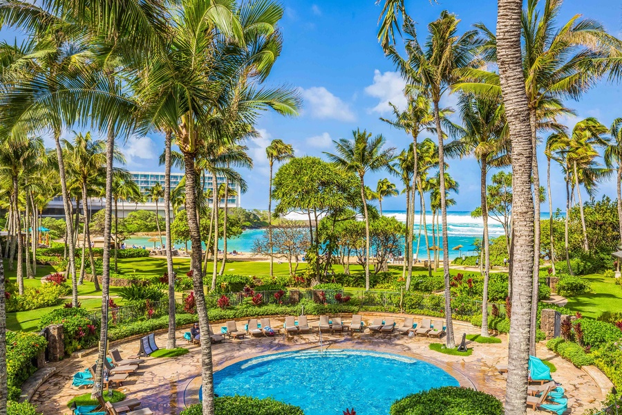 Step outside onto your private, 167-square foot lanai to take in views of the lush, tropical grounds, awe-inspiring Pacific, and dazzling pool just mere steps away from your back door
