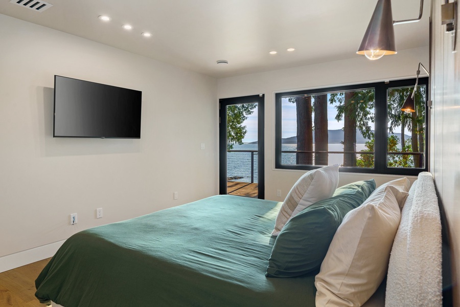 The primary bedroom features a king sized bed, TV and central AC.