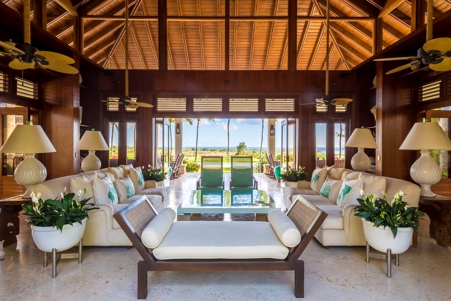 Elegant indoor-outdoor living with tropical views.