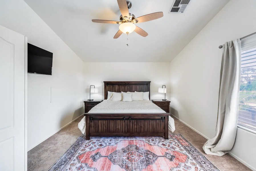 Primary bedroom with king bed