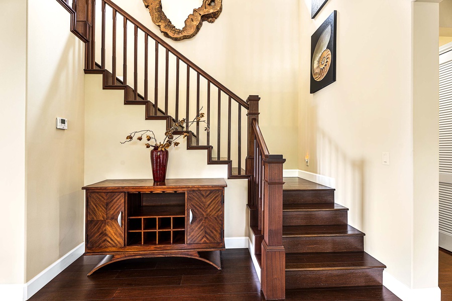 Stairs leading to the remainder of the bedrooms and upstairs living room