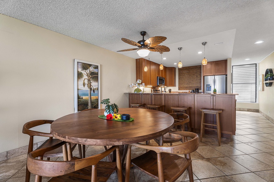 Dining table with four seats, perfect for small families.