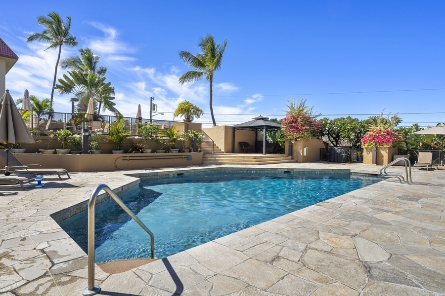 Inviting pool area with a relaxing atmosphere and open skies.