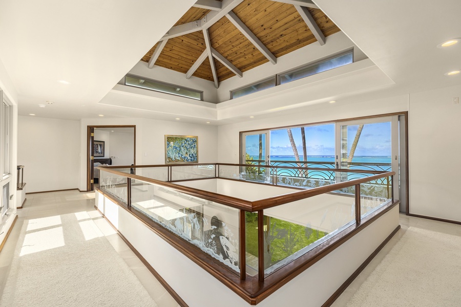 Overhead view of the main living area with sliding glass doors to the private backyard