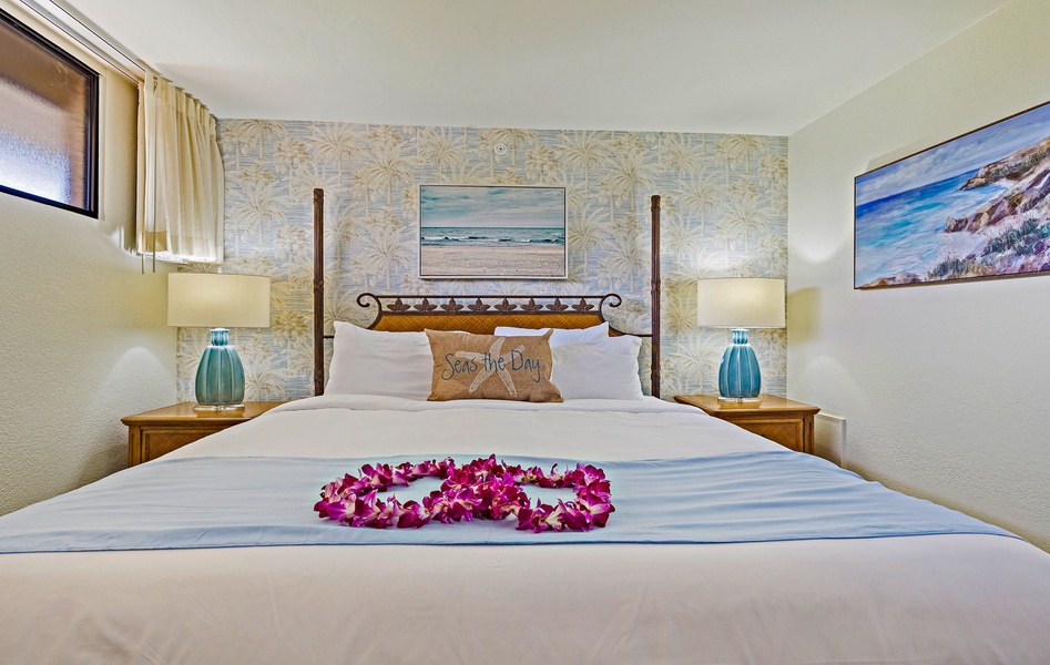 The serene bedroom at Kaanapali Shores 544 offers plush bedding, soft lighting, and coastal décor.