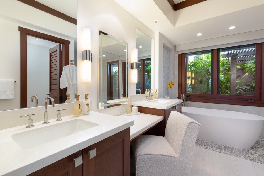 Spacious and modern primary bathroom with double vanity