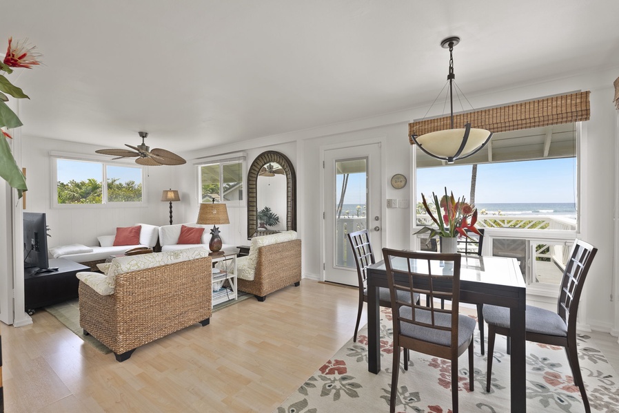 Relax in your coastal retreat where ocean views fill every window and tropical breezes flow through your bright, open living space.