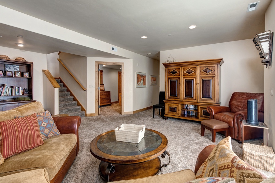 A second living room downstairs offers a quiet retreat. Check emails at an office desk, or sprawl out on the couch and watch a movie on the 50' flat-screen TV