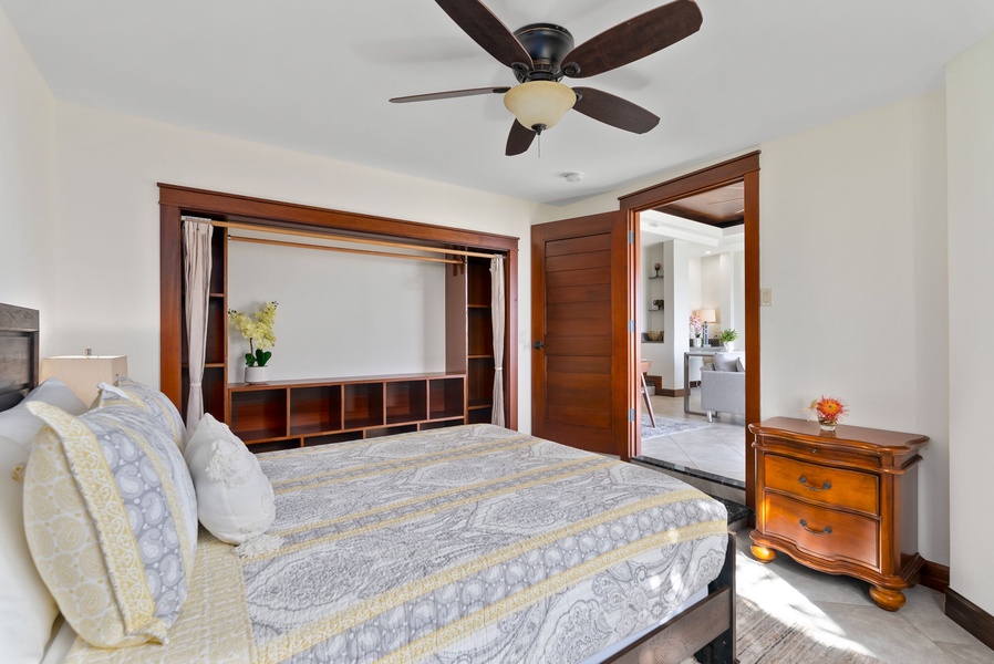 Spacious and inviting bedroom with beautiful wooden accents.