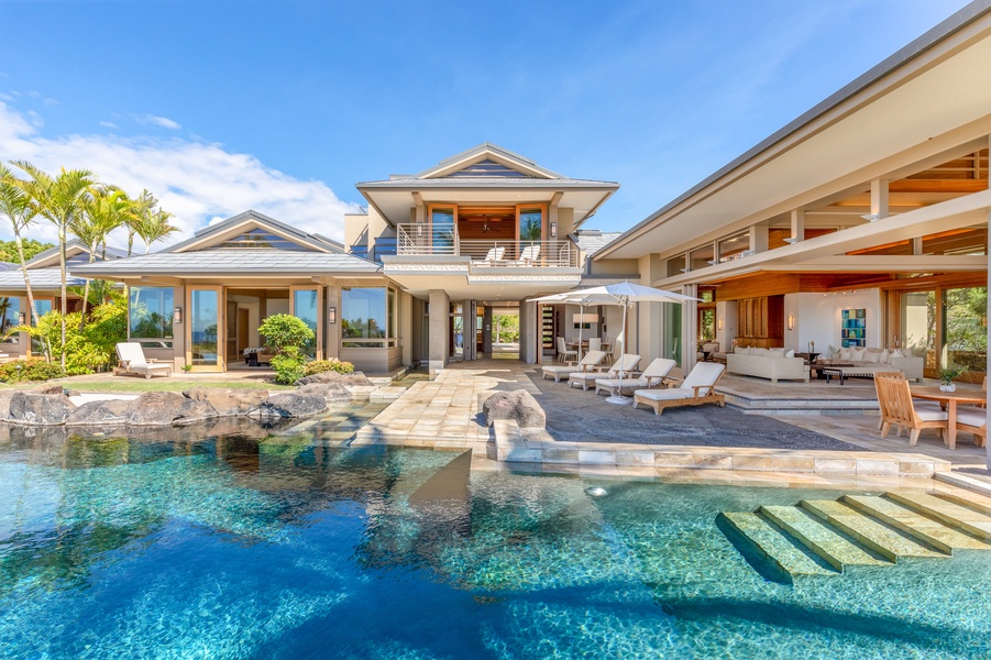 Easy indoor-outdoor living where the living room is steps away from the pool.