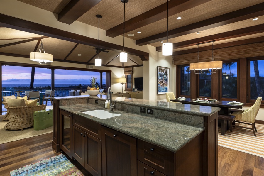 Gourmet kitchen, dining for 6, and a cozy great room with sunset views of Maui