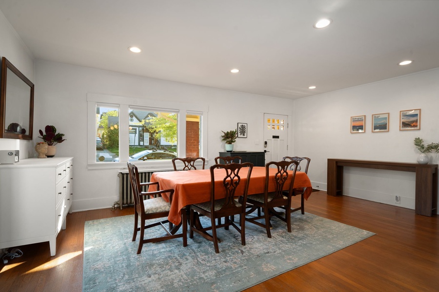 Share breakfast or evening plans around the bright dining table with natural light.