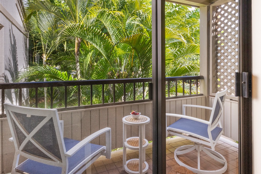 Enjoy your morning coffee on the primary's private lanai.