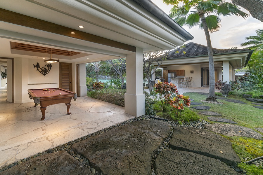 Guest house: Billiard room opens to inside courtyard steps from the tennis court, fitness center, outside BBQ, pool and spa.