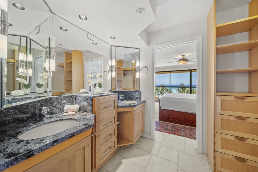 Immerse yourself in a luxurious ensuite main bathroom, offering dual vanities and a spa-like atmosphere.