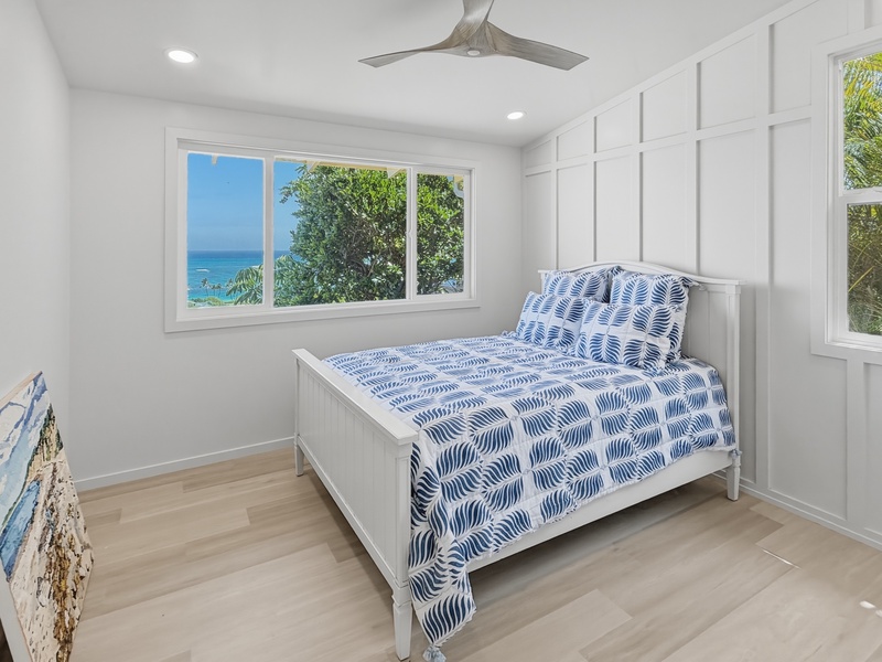 Rest in your private guest room with ocean views- where coastal breezes flow through the windows and blue linens echo the sea outside.