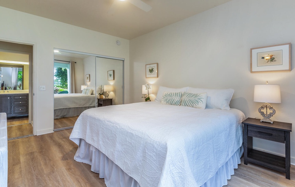 Primary has a king-size bed, direct lanai access, and private ensuite bathroom