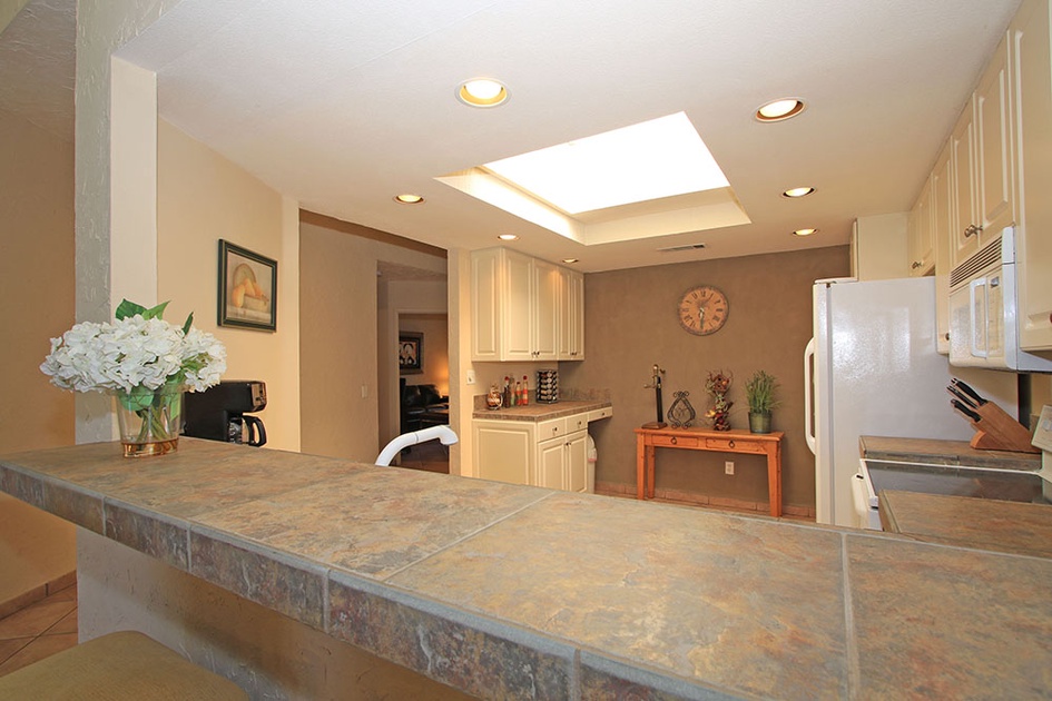 Kitchen overlooking foyer area