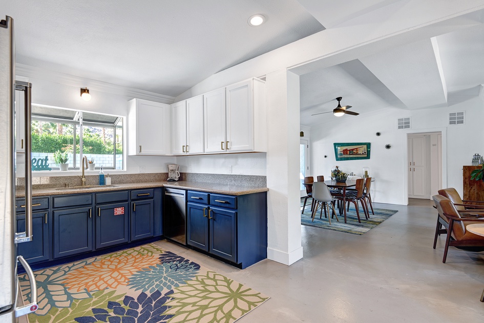 KITCHEN TOWARD LIVING SPACE AND DINING