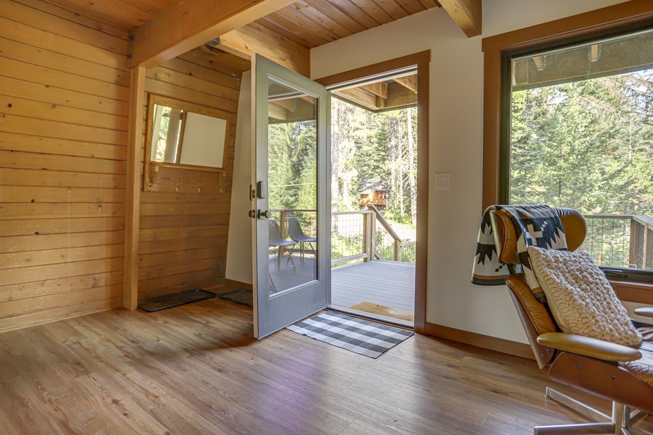 Nestled in the heart of a log cabin, cozy interiors whisper