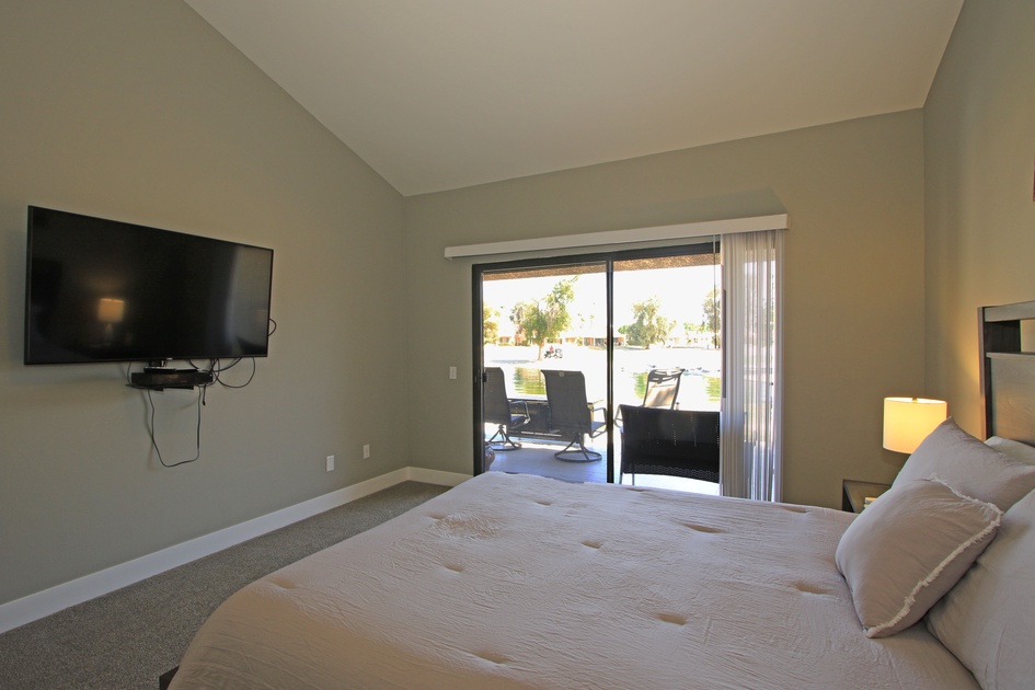 Queen Bed with Tv