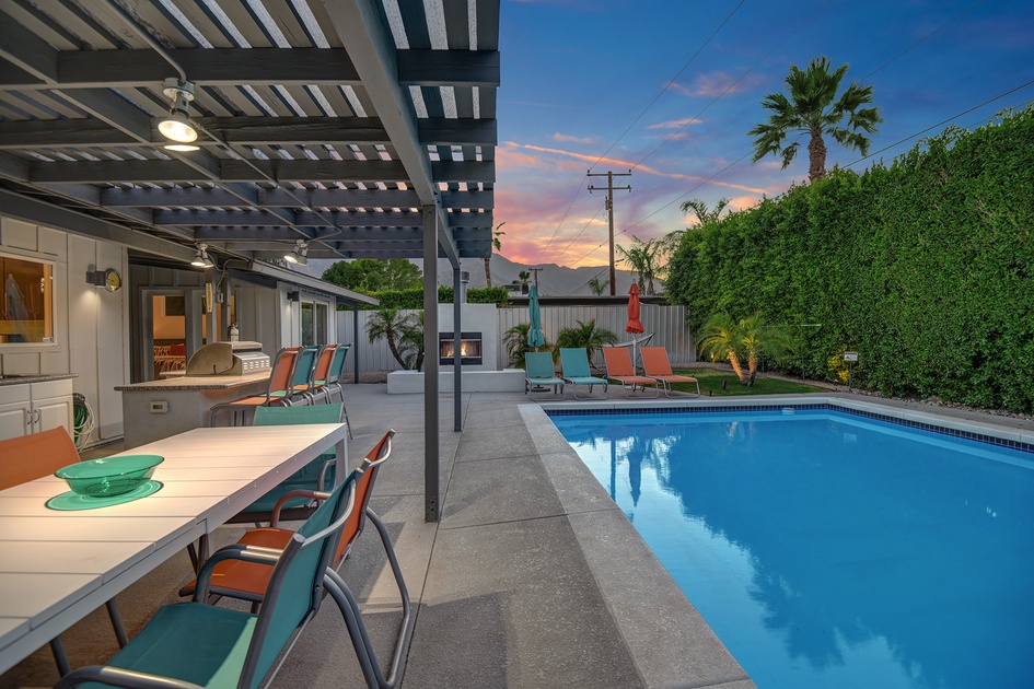 SUNSET HEAD ON PATIO TABLE AND POOL