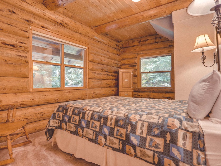 log cabin master bedrooms with fireplaces