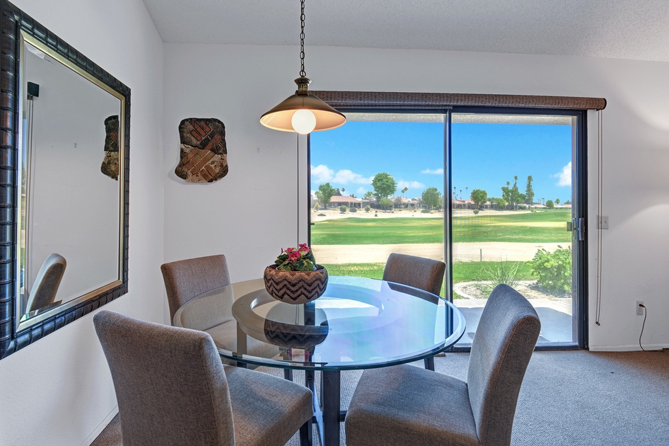 DINING TABLE OUT TO PATIO.jpg mls