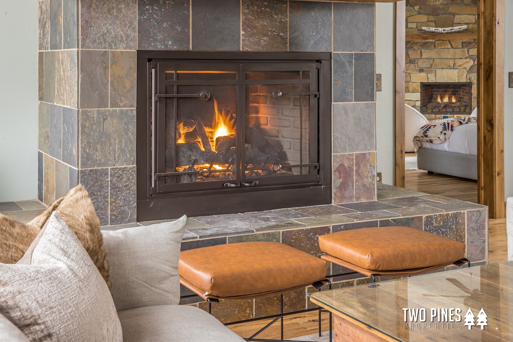 Cozy up by the Fireplace after a Long Day on the Slopes