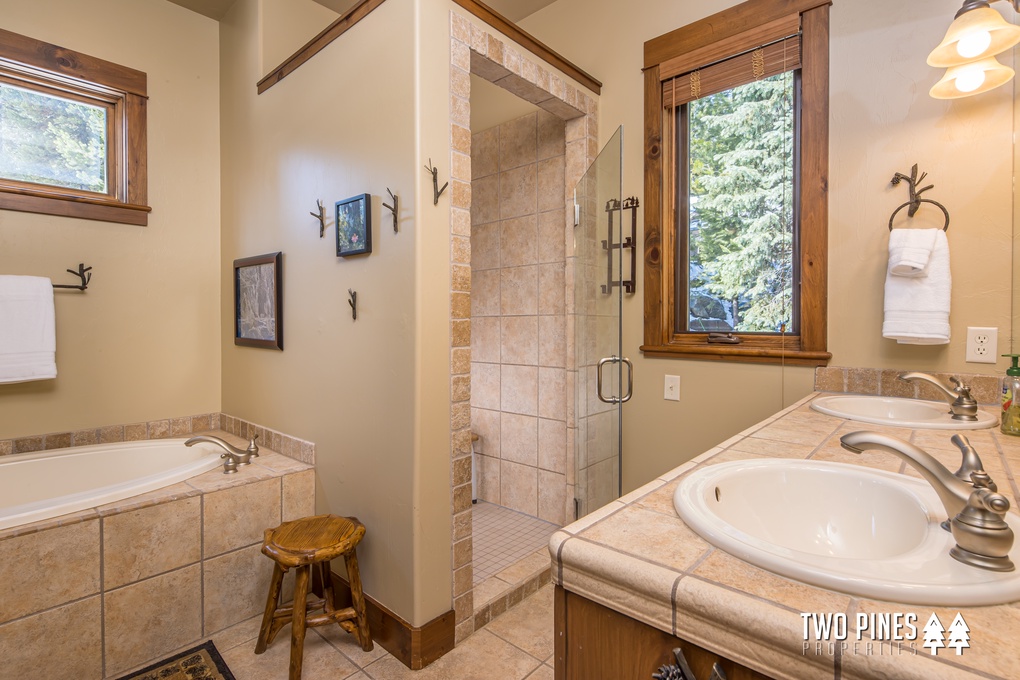 Primary En Suite with Dual-Vanity, Soaking Tub, and Walk-In Shower