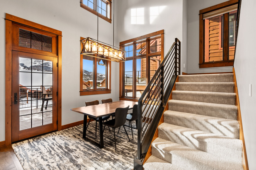 Dining Area, a bench has been added to the table since photos were taken. Seating for 6  (second floor)