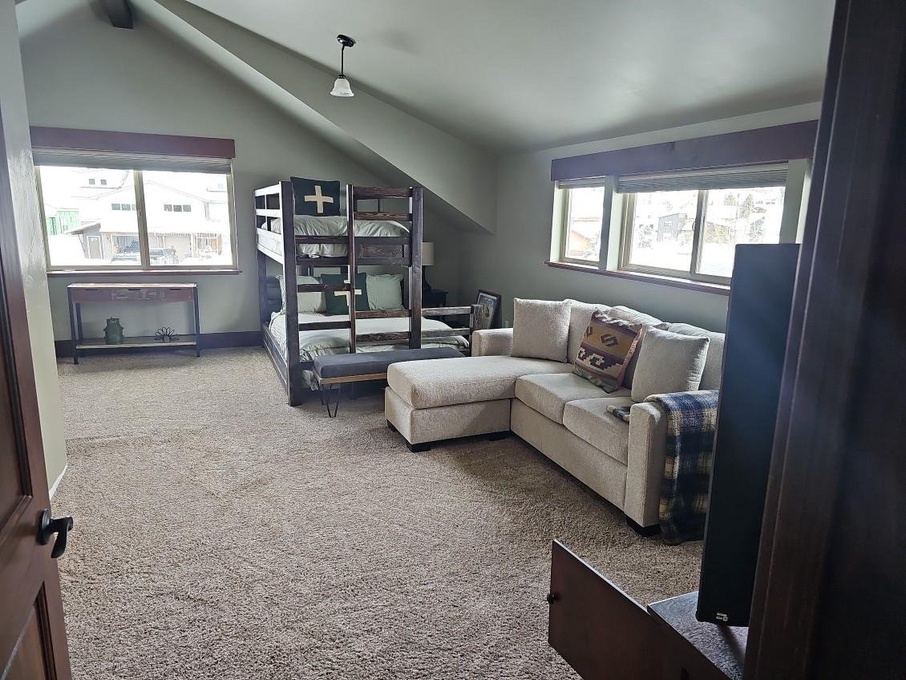 Bunk bed loft area with two twin over queen bunks
