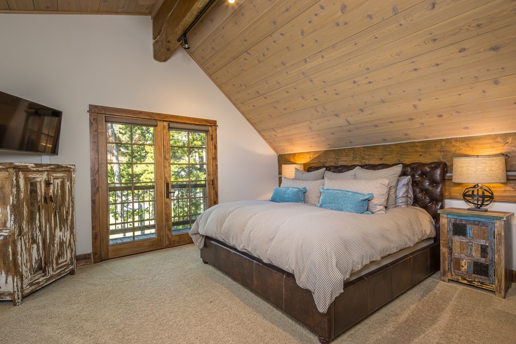 Upstairs Primary Bedroom w/ Private Deck