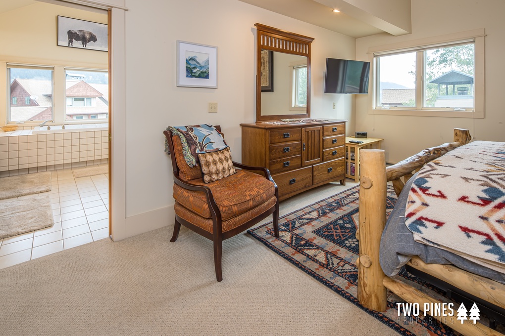 Dresser & Flatscreen TV in Primary Suite