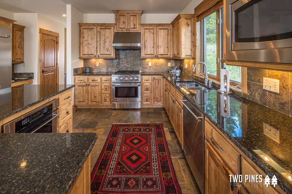 Open Concept Kitchen with Stainless Steel Appliances