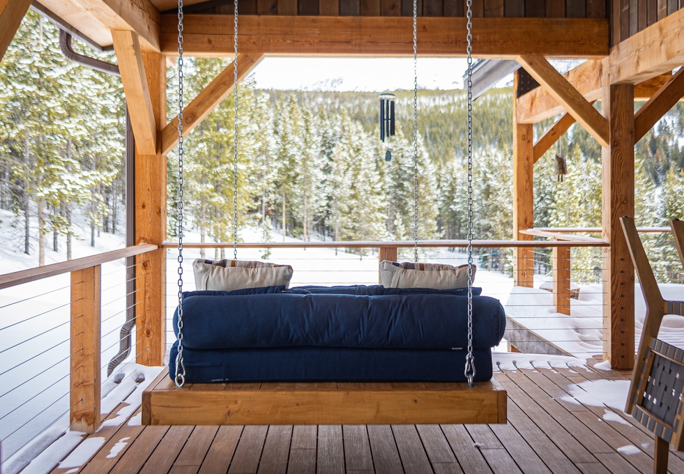 Back Deck with Wood Burning Fireplace, Seating, & Day Bed Swing