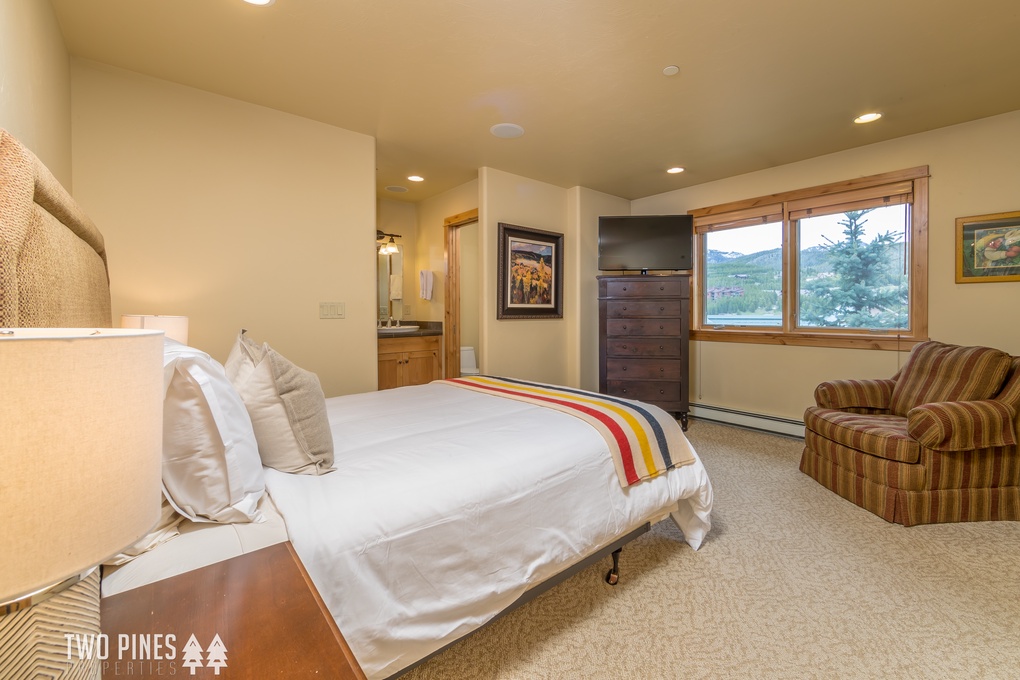 Main Level Primary- Queen Bed with TV and En Suite