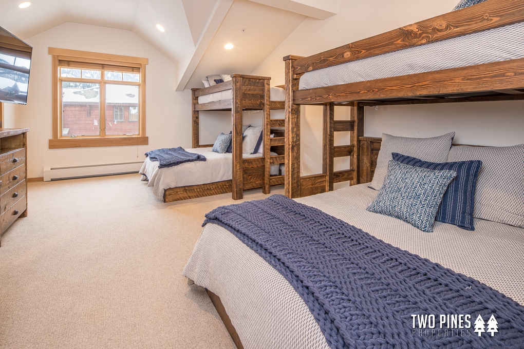 Upstairs Bunkroom with Two Full over Queen Bunks