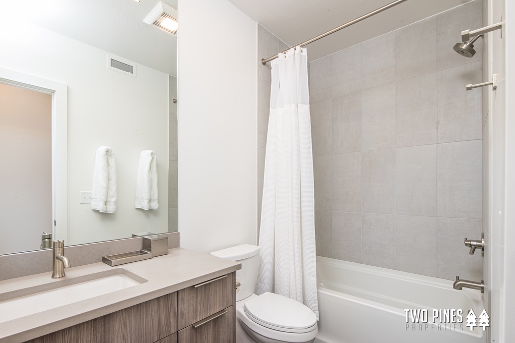 Shared Bathroom with Tub/Shower Combo