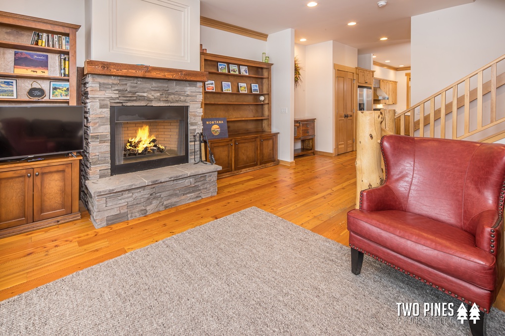 Living Room with Wood Burning Fireplace & Smart TV with Dish, Private Balcony