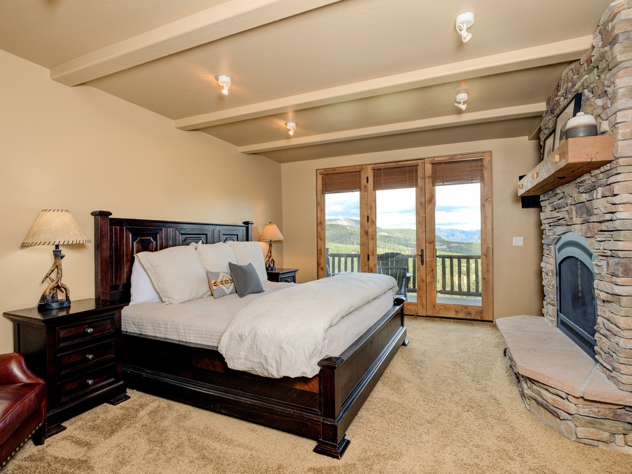 Primary bedroom with patio access