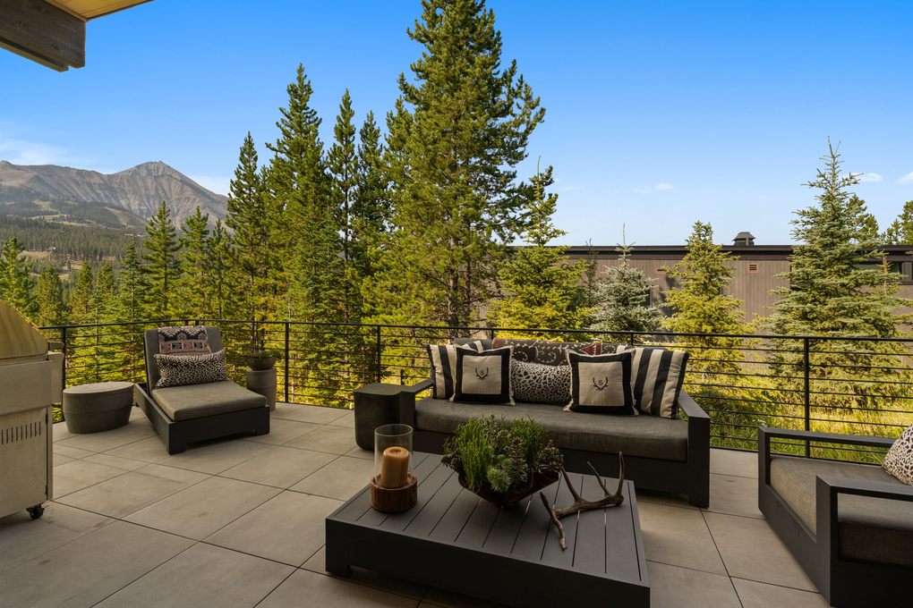 Exterior Patio with Seating and Grill