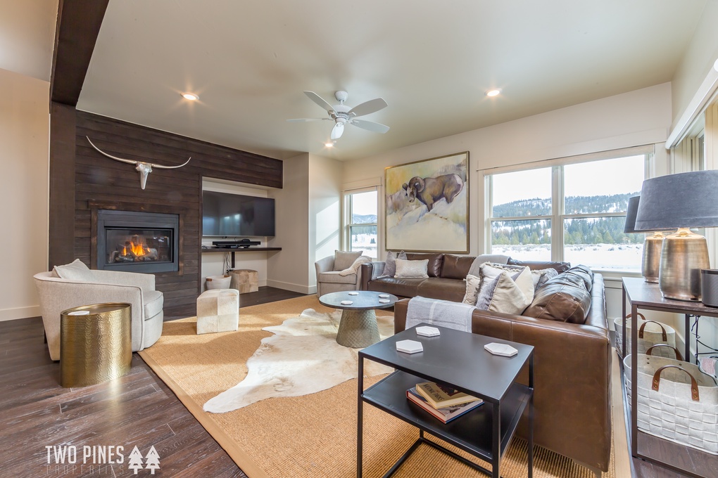 Living Area with gas fireplace, and large flat-screen TV