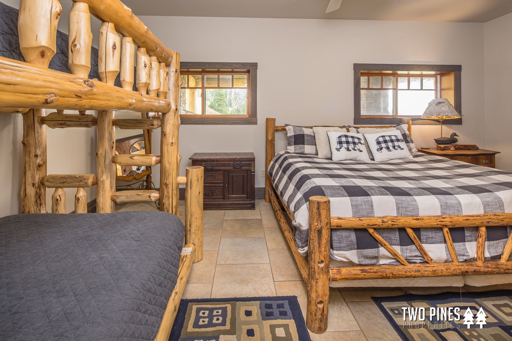 Lower Level Guest Bedroom with Twin Bunk Beds and King Bed