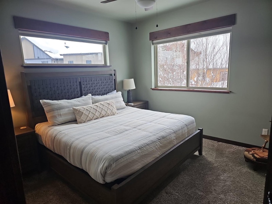Second guest room with king-sized bed