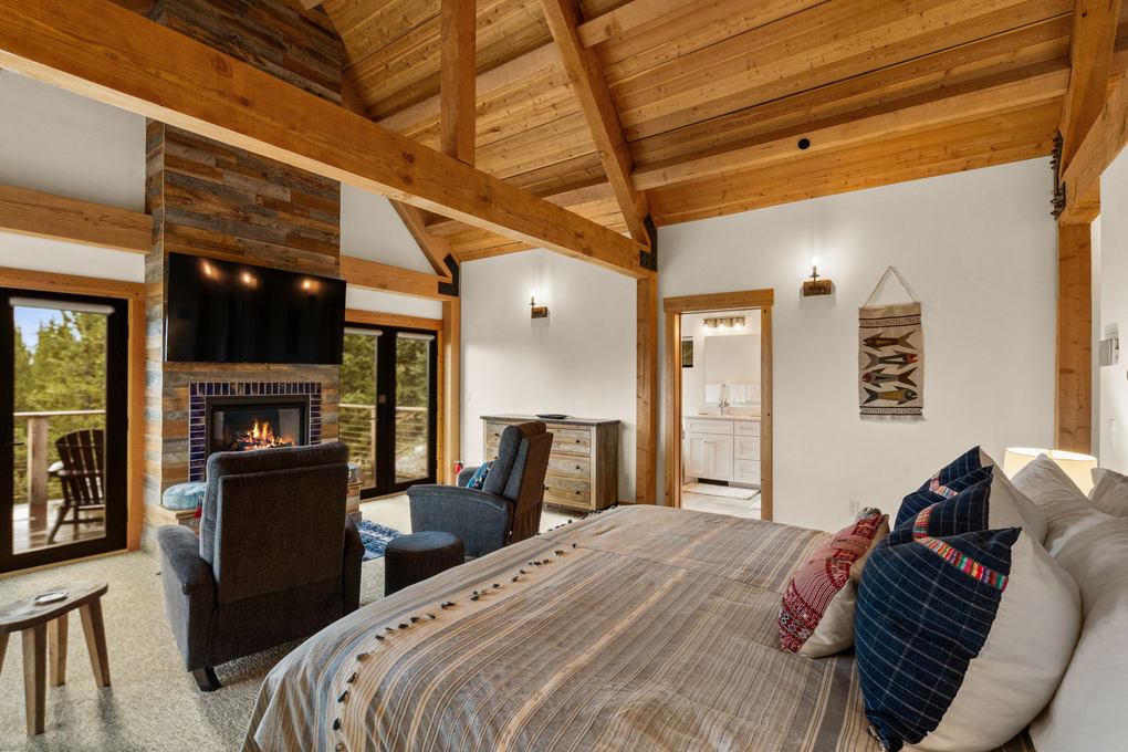 Primary Bedroom w. En-Suite Full Bath, Gas Fireplace, Office and Private Deck